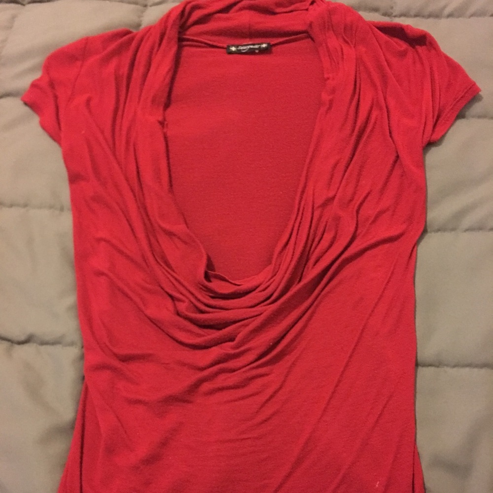 Red cowl neck top.